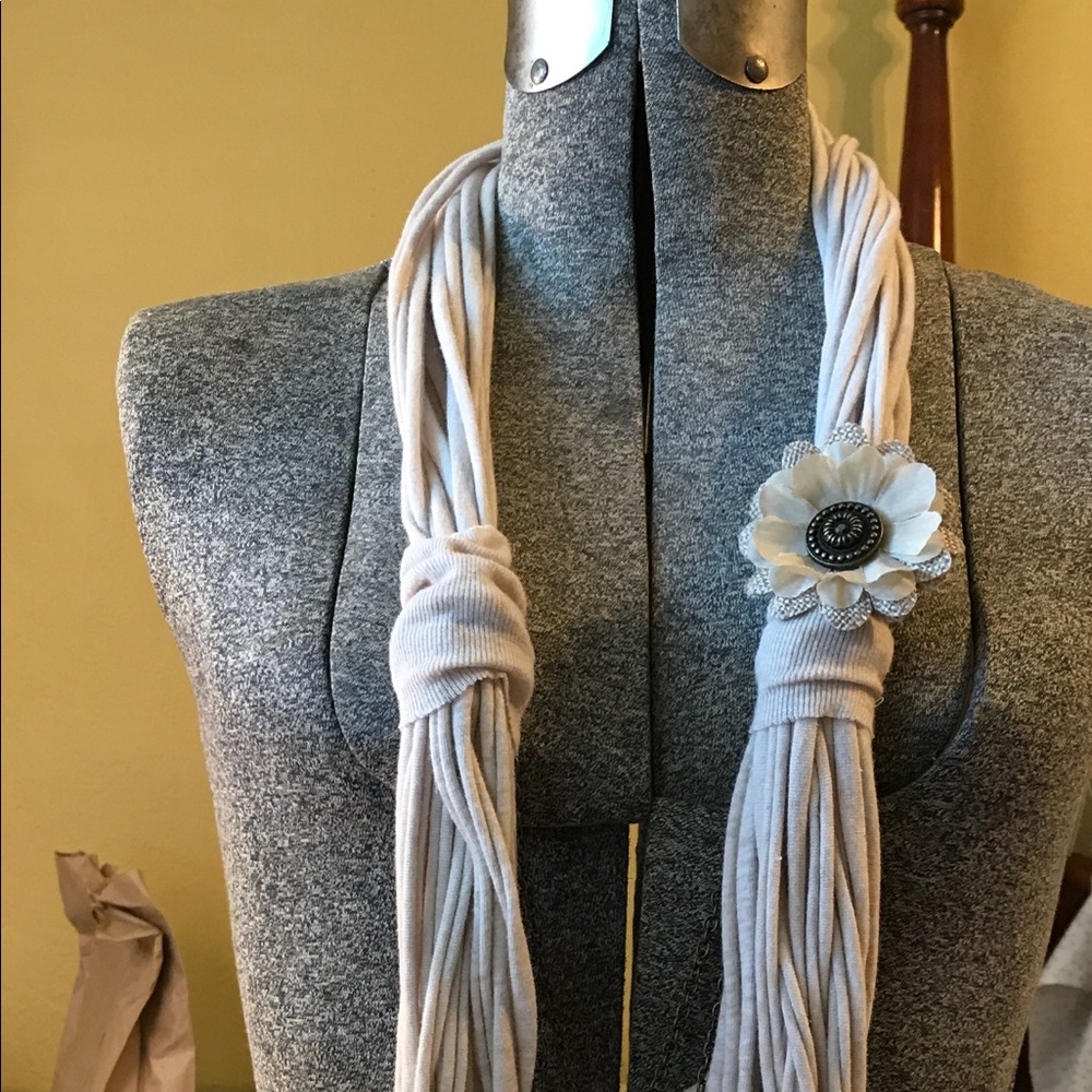Noodle tied infinity scarf  flower brooch attached